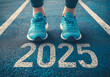 © 수동 김 - Close-up of a female runner's legs in the starting position on a running track with the text '2025' written, a sports concept. A new year's resolution background for a design and print template.