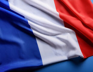 French flag waving in the wind on side position provides copy space for text isolated dark blue background