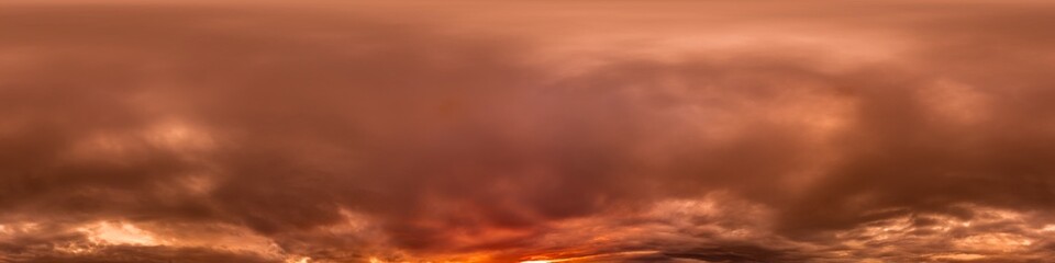 Wall Mural - Dramatic Sunset sky 360 panorama. Vibrant sky with bright glowing red pink Cumulus clouds. HDR 360 seamless spherical panorama. Sky dome for aerial drone panoramas. Climate and weather change.