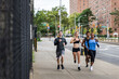 © oneinchpunch - Group of urban runners running on the street in New york city, conceptual series about sport and fitness