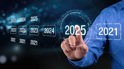 A person is pressing a button on a computer screen that displays the years 2021 and 2025. Concept of progress and advancement, as the years are displayed in a linear fashion