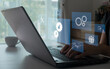 © MUNTHITA - Data integration concept, data system technology, integration icon with gears. Businessman use laptop with virtual system integration technology. Industrial and smart business and automation solution.