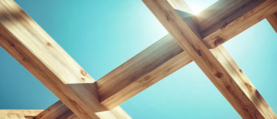 Wall Mural - Close-up view of wooden beams in a house construction project against a clear blue sky showcasing a traditional rafter system design