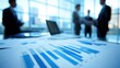 © WS Studio 1985 - Business People Collaborating in Office with Financial Reports on Table and Graphs Showing Data Trends and Analysis in Focused Workspace Environment