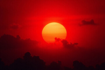 Wall Mural - abstract dark red background. dramatic red sky. red sunset with clouds. fantastic sunset background 