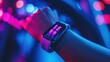 © MUMTAZ - A close-up of a smartwatch displaying time and fitness data in vibrant neon lighting.