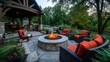 © Penatic Studio - Cozy Outdoor Patio with Fire Pit and Lounge Seating