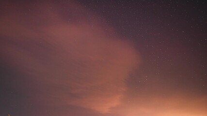 Wall Mural - Bright Dramatic Trails Of Stars And Meteors. Amazing Night Starry Sky Transition To Bold Morning Sky. Sky In Different Colors. From Dusk Till Dawn. Misty Night Time. Fast Running Clouds Timelapse