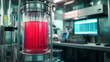 © Anthichada - A bioreactor stimulating a vibrant red culture in a state-of-the-art laboratory. The bioreactor features a sleek, transparent chamber with visible red liquid. Bioreactor undergoes cultivation