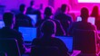 © Thanawut - A group of people working on laptops in a dimly lit room with colorful lighting, suggesting a modern learning or collaborative environment.