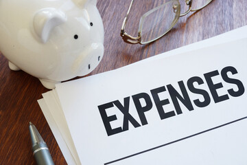 Wall Mural - Expense report is shown as business and financial concept