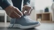 © Hybrid Theory - Morning activity preparing for a run indoor space lifestyle focus calm environment close-up view on exercise preparation