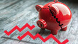 © ARM - Downward financial trend illustrated by a cracked piggy bank on a wooden surface symbolizing economic struggles and savings depletion