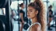 © Phatharaporn - Focused Woman in the Gym