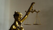 © ADDICTIVE STOCK - Golden Lady Justice Statue with Scales of Balance
