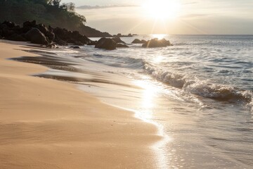 Poster - Beautiful sunset scene with the sun dipping into the ocean on a sandy beach