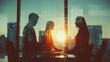 © Chandlerlikes - Silhouette of business people working together in office, double exposure with light effects