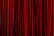 © Ruslan - Red curtain in theatre background