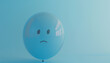 © Oleksiy - Blue balloon with sad face on light blue background