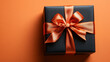 © Almaz - Elegant Surprise: Black Gift Box with Orange Satin Ribbon'