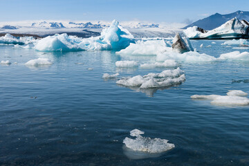 Wall Mural - Sunshine over Jokulsarlon glacier lake in Iceland