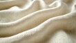 © Roman - Close up of a white cloth with a brown stripe, white background