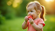 © Leah - Adorable Little Girl Eating a Tomato