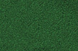 © Brilt - Artificial grass fake turf synthetic lawn field macro closeup, gentle shaded shadow area, green sports astroturf texture, natural horizontal textured background pattern, large detailed copy space