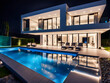 © Nyetock - Modern villa with pool at night. Home real estate Luxury exterior with led lights. Nobody inside.
