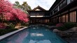 © Narongsag - Tranquil Asian Garden House with Pool and Cherry Blossoms