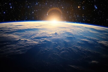 Wall Mural - Sunrise over Earth from space, with a glowing sun and stars in the background.