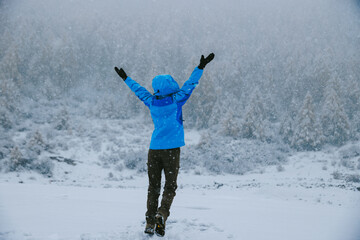 Sticker - Asian woman enjoy the beautiful snowing landscape