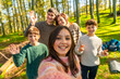 © unai - Family taking selfie in the forest enjoying nature