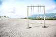 © dailyhomestory.id - Empty aesthetic wooden swing on sand beach