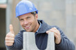 © auremar - handsome construction showing a thumb-up