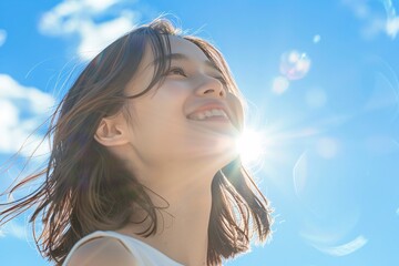 beautiful japanese woman on a sunny day with a vibrant blue sky