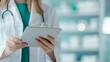 © peera - Female pharmacist examining inventory in a medical store, using a digital tablet, showcasing attention to detail and modern technology in a professional environment.