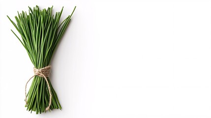 Fototapete - Isolated on white background bundle of chives tied together with natural string creating an elegant herb presentation and side empty space for text Stockphoto style