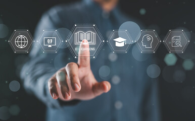 Leinwandbilder - Online education concepts. A man interacts with e-learning icons virtually, signifying modern online education methods. Learning online webinar, video tutorials, training study course.