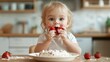 ©  Shomixer - A young child is enjoying a plate of strawberries and cream, with a joyful and messy face, in a bright kitchen setting, capturing the essence of childhood delight.