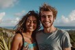 © Markus Schröder - Portrait of a merry mixed race couple in their 20s sporting a technical climbing shirt isolated on backdrop of an idyllic countryside