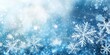 © StockKing - Winter holiday snow background features an abstract backdrop with snowflakes in beautiful blue tones, creating a perfect winter holiday snow atmosphere for seasonal designs.