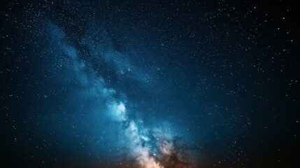 Wall Mural - night sky with milky way galaxy and numerous stars visible against a deep blue background, showcasin