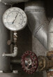 © num - View of Water pressure gauge meter and Old water control valve on rust steel pipe in production water process for Residential water supply. Space for text, Selective focus.