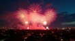 © Александр Бердюгин - Bright red and gold fireworks illuminate the night sky over a cityscape, celebrating the New Year
