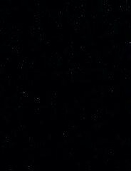starry sky with numerous small bright stars scattered across a deep black background evokes a volumi