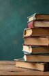 © Dariya - stack of books on a blackboard