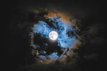 Wall Mural - full moon over the clouds