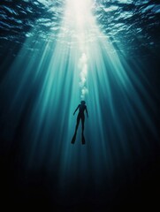 Wall Mural - A lone diver explores the mysterious depths of ocean water with sunlight streaming through