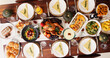 © peopleimages.com - Above, meal and thanksgiving with table in dining room for celebration, nutrition and festive holiday. Catering, vegetables and reunion with food and event at home for dinner, hosting and health